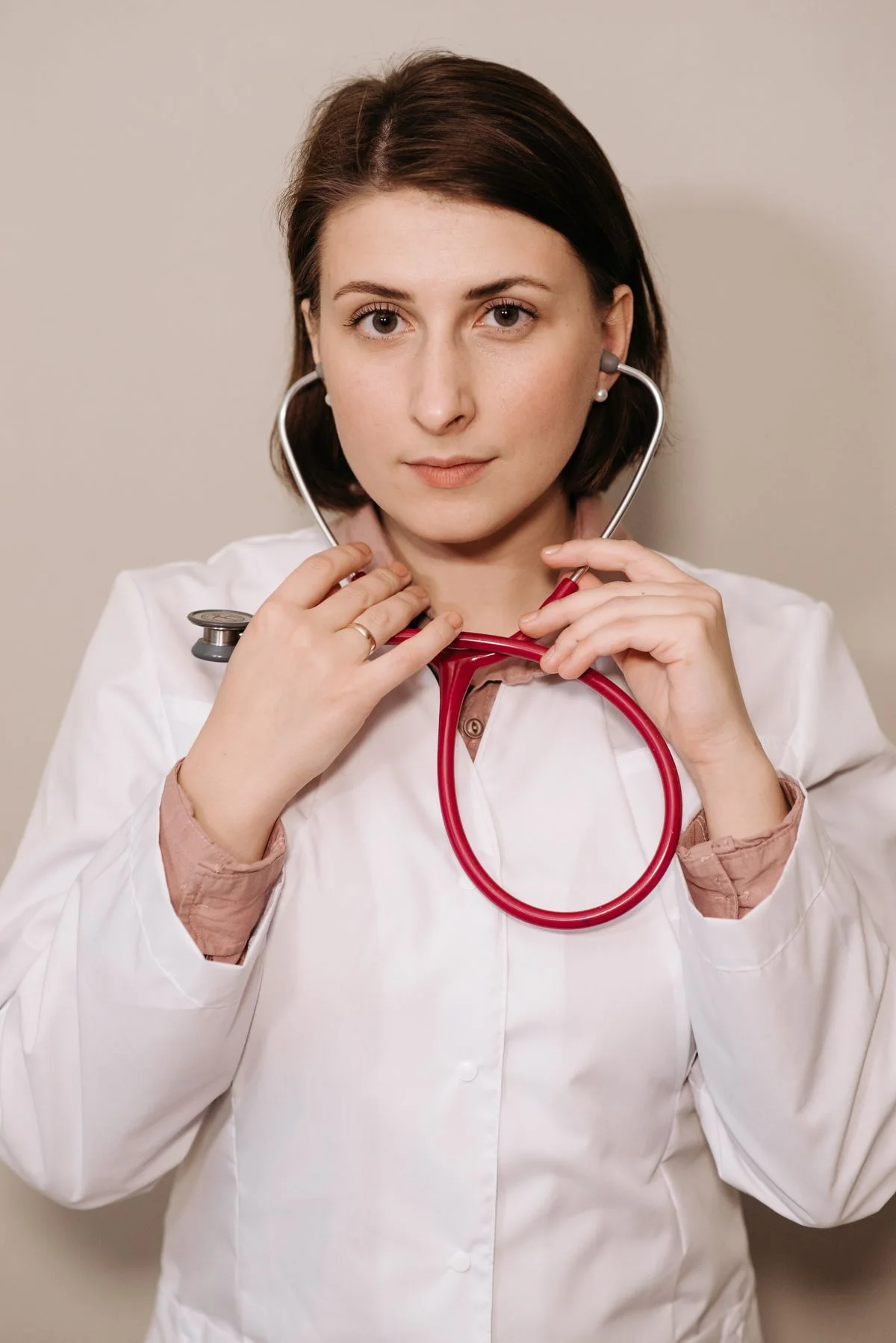 White clinical coat with a stethoscope in a studio reference photograph